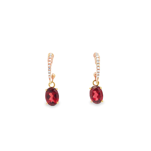 14kt Yellow Gold Earings With 2 5x7 Oval Garnets At 1.99tcw And 18 Rou