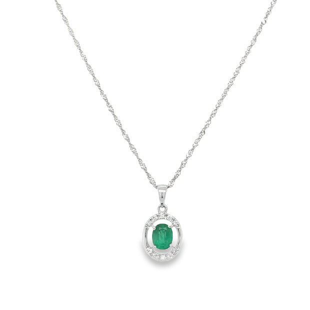 14Kt White Gold Pendant With Oval Emerald Cut Center .34ct And 10 Rouh