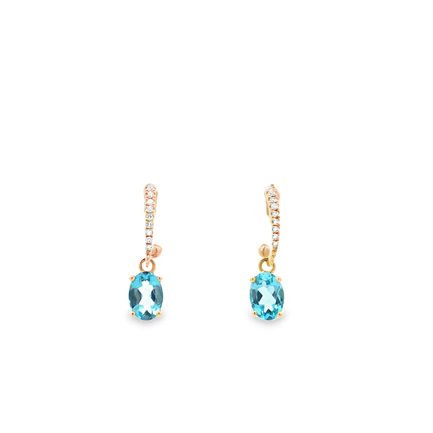 14kt Yellow Gold Earings With 2 5mm Oval Blue Topaz At 1.66tcw And 18