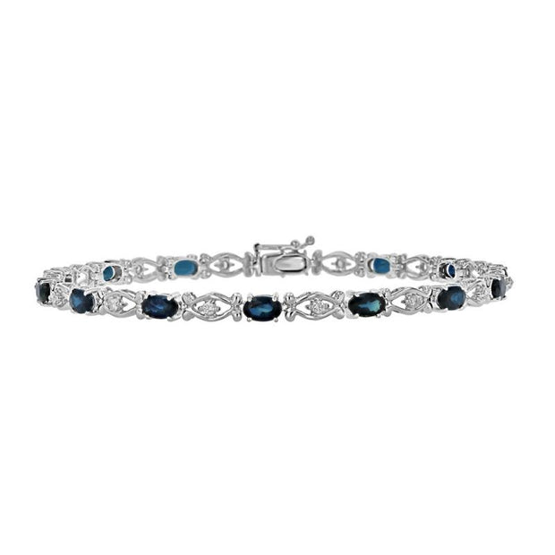 14kt White Gold Bracelet With 14 Alternating Oval Blue Sapphires At 4.