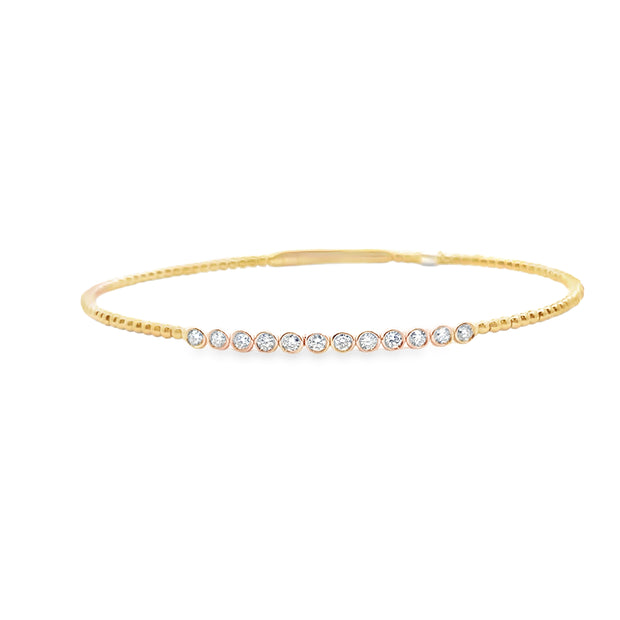 14kt Yellow Gold Bangle With 12 Round Bezel Set Diamonds At .35tdw I1