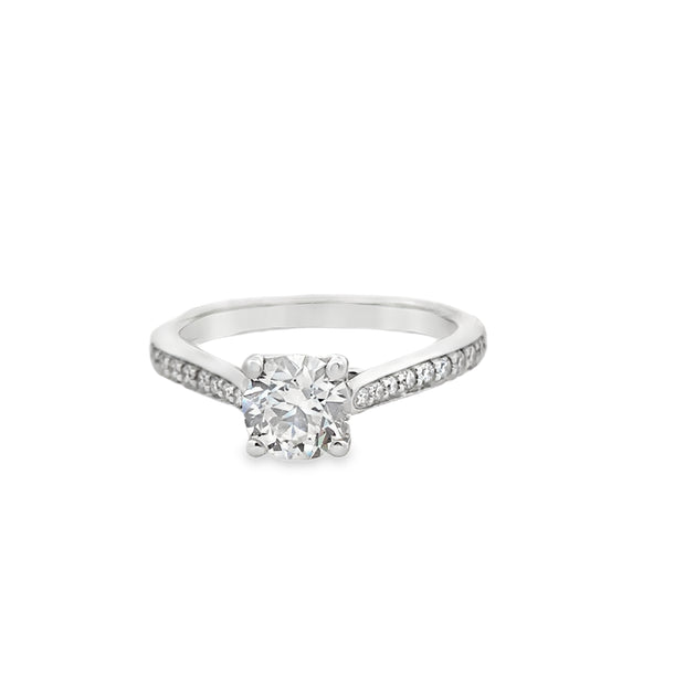 14kt white gold engagement ring with 18 round channel set diamonds on